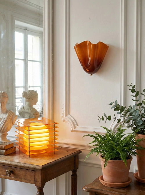 amber sconce paneled wall