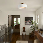 hallway light, wooden console, metal railing
