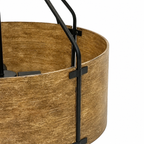 Close-up of a cylindrical pendant light shade with a distressed brown wood-grain finish and black metal support brackets and hanging hardware, shown against a white background.
