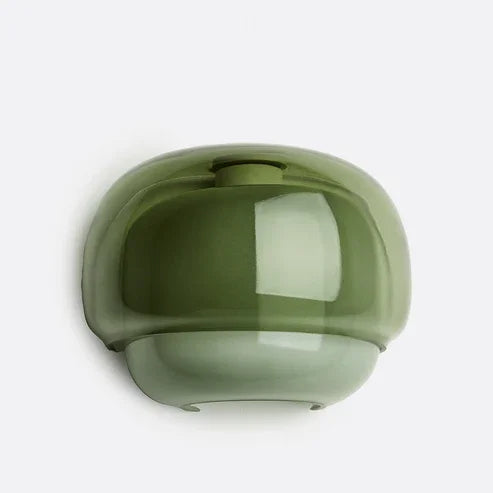 A glossy, dome-shaped wall sconce in a muted olive green color, shown against a plain light gray background.