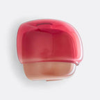 Sanae macaron glass wall sconce in red, shown against a white background